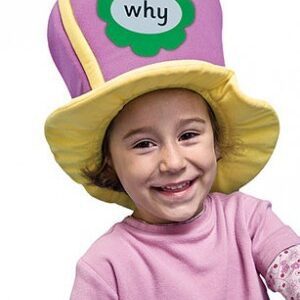A little girl wearing a hat with the word " why " written on it.