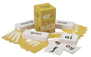 A stack of cards with words and letters on them.