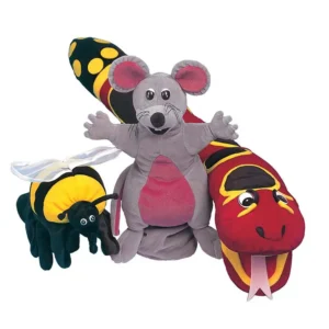 A group of stuffed animals that are sitting on the ground.